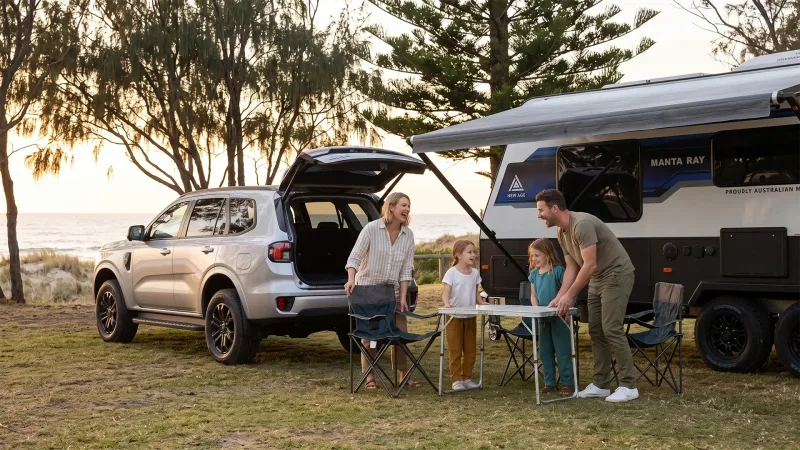Caravan set up at a coastal site on a touring trip